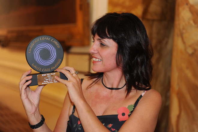 Image of OHT manager accepting award