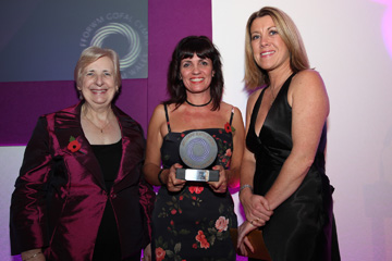 Annette Edwards accepting award